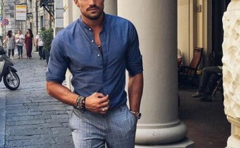 man-in-texas-shirt-russian-collar-and-grey-pants